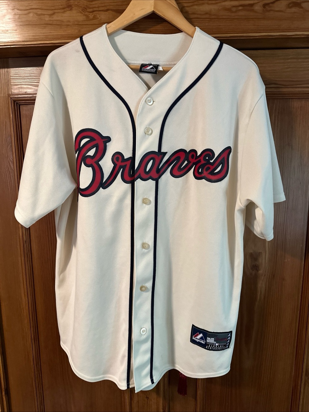 Vintage Majestic Braves Cream Youth Baseball Jersey with Navy & Red Script sz LG